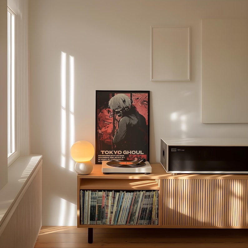 May include: A wooden cabinet with a record player, a globe lamp, and a framed poster of the anime Tokyo Ghoul. The cabinet has shelves filled with vinyl records.