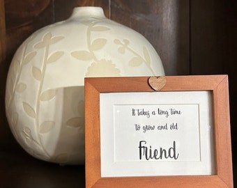 It takes a long time to grow and old Friend Standing Frame in glass with wooden heart.