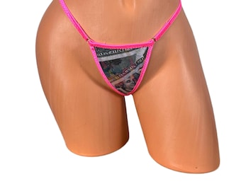 Braguita de bikini tipo tanga con estampado holográfico de dinero y ribete rosa intenso