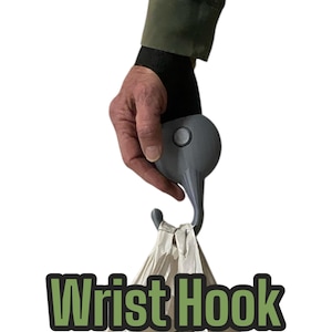 May include: A gray wrist hook with a white plastic bag hanging from it. The bag contains a can of food. The text "Wrist Hook" is written in green letters below the bag.