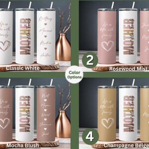 May include: Four different color options for a personalized stainless steel tumbler. The tumbler features the word "MOTHER" with the text "The Heart of Our Family" underneath. The tumbler also has a heart design and space for names to be added.