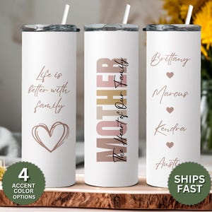 May include: Three stainless steel tumblers with different designs. The first tumbler has the text "Life is better with family" and a heart. The second tumbler has the text "Mother The Heart of Our Family". The third tumbler has the text "Brittany", "Marcus", "Kendra", and "Austi" with hearts between each name.