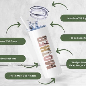 May include: A white 20 ounce stainless steel tumbler with a sliding lid and a straw. The tumbler features a pink, beige, and brown design with the text "MOTHER The Heart of Our Family".
