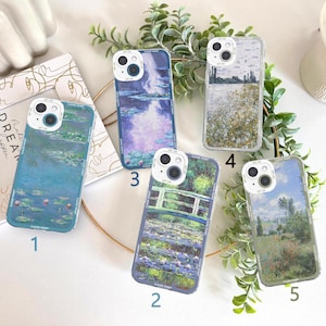 May include: Five clear phone cases with art prints. The cases feature famous paintings, including water lilies, a bridge over water, and a field of flowers. Each case has a camera cutout and a white border with text.