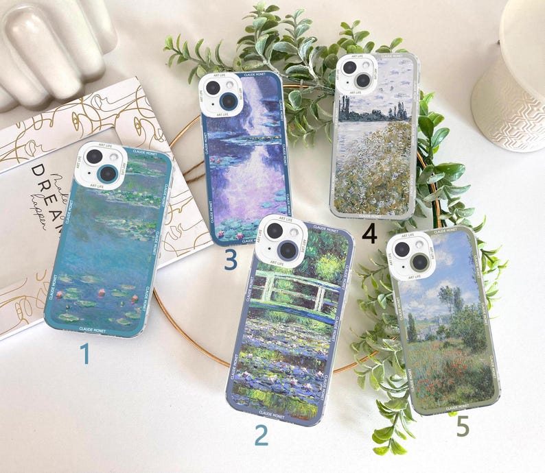 May include: Five clear phone cases with art prints. The cases feature famous paintings, including water lilies, a bridge over water, and a field of flowers. Each case has a camera cutout and a white border with text.