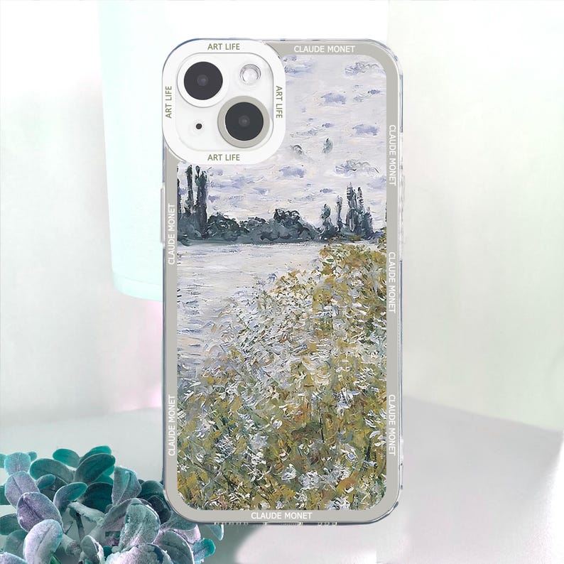 May include: A clear phone case featuring a landscape painting in the style of Claude Monet. The artwork depicts a river scene with trees and foliage in shades of green, white, and gray. The case has the text "ART LIFE" and "CLAUDE MONET" printed on it.