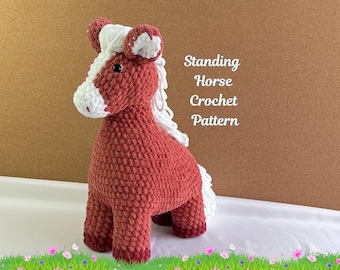 May include: A crocheted standing horse pattern. The horse is red with a white mane and tail. The pattern is written in English.