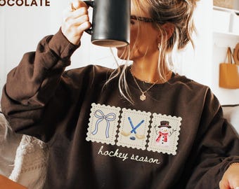 Hockey Season Coquette Bow Sweatshirt, Tis The Season Hockey Stamp Sweater,Christmas Hockey Player Gift,Cute Hockey Lover Snowman Sweatshirt