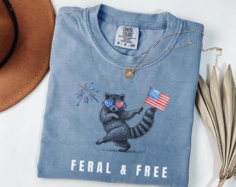 Chemise drôle de raton laveur du 4 juillet, chemise couleurs sauvages et de confort gratuit, chemise meme d'été américaine Feral USA, cadeau mignon jour de l'indépendance patriotique