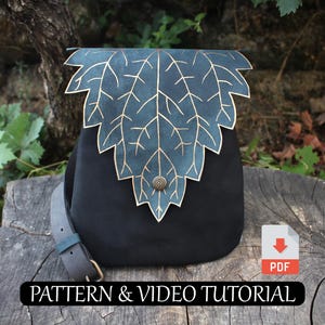 May include: Black leather shoulder bag with a leaf-shaped flap in teal and gold. The bag has a strap and a decorative button. The text "PATTERN & VIDEO TUTORIAL" is at the bottom of the image.