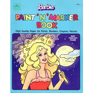 May include: A colouring book featuring a cartoon image of Barbie with blonde hair, wearing a red dress and holding a microphone. The book cover is blue with a purple sky and a yellow moon. The title of the book is "PAINT 'N MARKER BOOK" and the text "High Quality Paper for Paints, Markers, Crayons, Pencils" is printed below the title. The text "EASY TEAR-OUT PAGES" is printed in the top right corner of the cover.