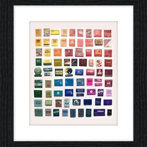 May include: A collection of vintage matchboxes arranged in a rainbow pattern. The matchboxes are from various brands and feature different designs and colors.