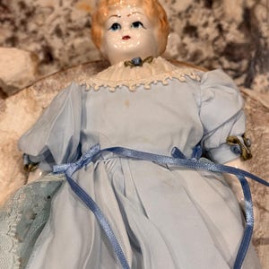Antique Porcelain Doll with Red Hair, Blue Lace Dress, 11” Victorian-Style Collectible