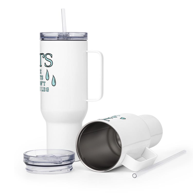 May include: White travel mug with a black handle and a blue and white graphic that says "It's the little things that don't make sense" with two blue raindrops. The mug has a lid and a straw.