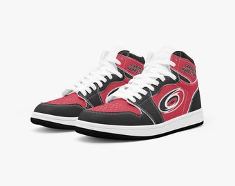 Zapatillas deportivas altas no oficiales para aficionados de los Carolina Hurricanes.