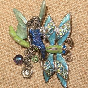 Vtg KIRKS FOLLY Fairy Riding a Dragonfly Brooch, Silver tone Enamel