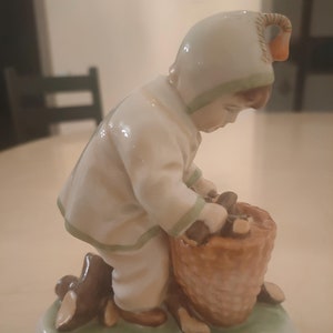 Porcelain figurine &quot;A boy collects brushwood&quot;. Manufactured by ZSOLNAY (Hungary)