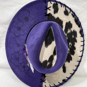 Purple Wide Brim Hat: Black/White Cowhide Fabric With Black Leather Lacing And Flowers Burned On Brim Black Hat Band And Feathers