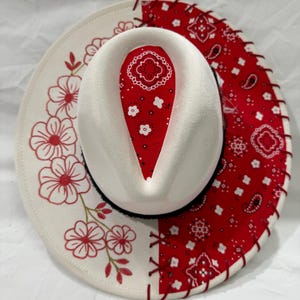 Hand Burned Wide Brim Hat Ivory: Red Bandanna Fabric Leather Lacing And Red Flowers Painted On Brim Black Hat Band With Black/Red Feathers