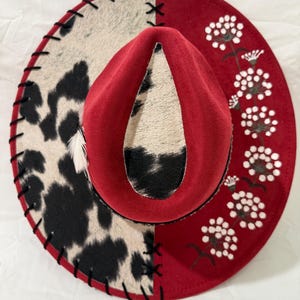 Hand Burned Wide Brim Hat Red: Cowhide Fabric With Black Leather Lacing And Flowers Burned/Painted On Brim Black/White Band With Feathers