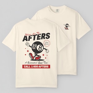 May include: Off-white t-shirts with a cartoon 8-ball character graphic. The front of the shirt has the text "Where Are The AFTERS" and "A Guaranteed Good Time". The back of the shirt has a smaller graphic of the 8-ball character.