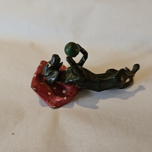 Vintage Miniature Vienna Bronze Dachshund Playing with Green Ball Laying On Red Pillow — Made in Austria