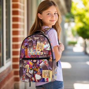 May include: A backpack featuring a colorful collage of characters and the text The Amazing Digital Circus. The design includes various cartoon figures in purple, red, and yellow tones, with a black zipper closure and side mesh pockets for storage.