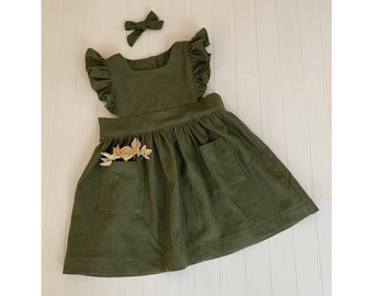 girls green pinafore
