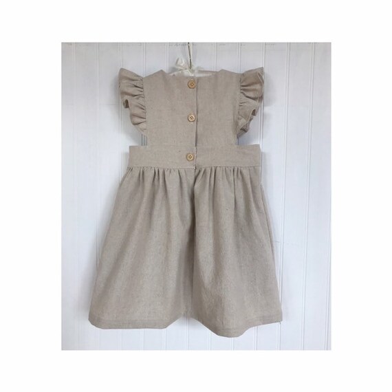 beige pinafore dress