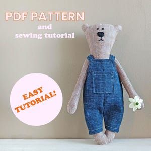 May include: PDF pattern and sewing tutorial for a plush toy bear wearing denim overalls. The text "EASY TUTORIAL!" is on a pink circle.