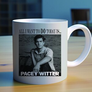 May include: White ceramic mug with a black and white image of a man. The text "ALL I WANT TO DO TODAY IS..." is above the image, and "PACEY WITTER" is below. The mug has a curved handle and is designed for hot beverages.