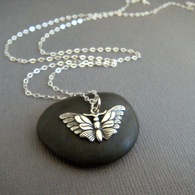 tiny sterling silver butterfly moth necklace petite insect charm dainty delicate decorative wings jewelry everyday nature enthusiast 3/4 image 1