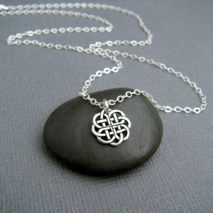 tiny sterling silver celtic circle necklace. delicate oxidized pattern. dainty pendant. simple. geometric. everyday. zen. minimalist 3/8"