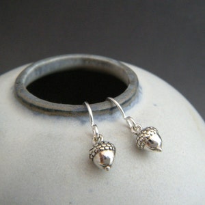 tiny silver acorn earrings. small sterling silver dangle woodland strength simple everyday drop leverback nature botanical gardener gift 1/4