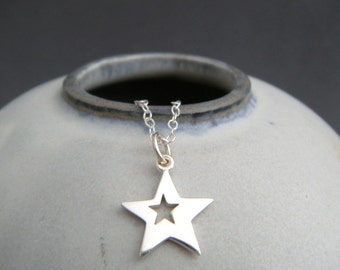 small silver star necklace. tiny lucky star cut out charm sterling pendant simple everyday jewelry. dainty delicate. gift for her women 1/2"