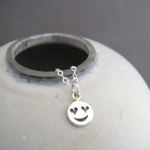 sterling silver heart eyes emoji necklace. tiny love pendant. small text happy smiley face jewelry. quirky kitschy fun sweet gift charm 3/8&quot;