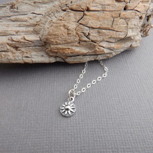 tiny sterling silver sun necklace. rustic boho pendant. simple everyday sunburst charm. good energy symbol. delicate petite dainty gift 1/4&quot;