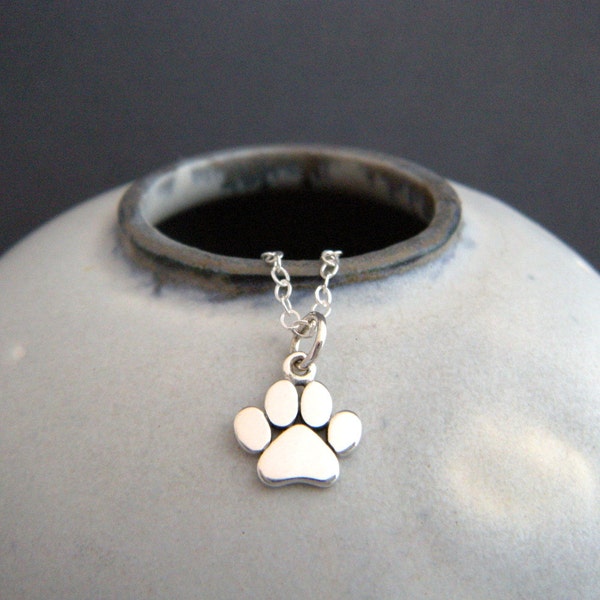 tiny silver paw print necklace. small sterling silver pet pride pendant. gift animal lover love charm simple pawprint dog cat jewelry 3/8"