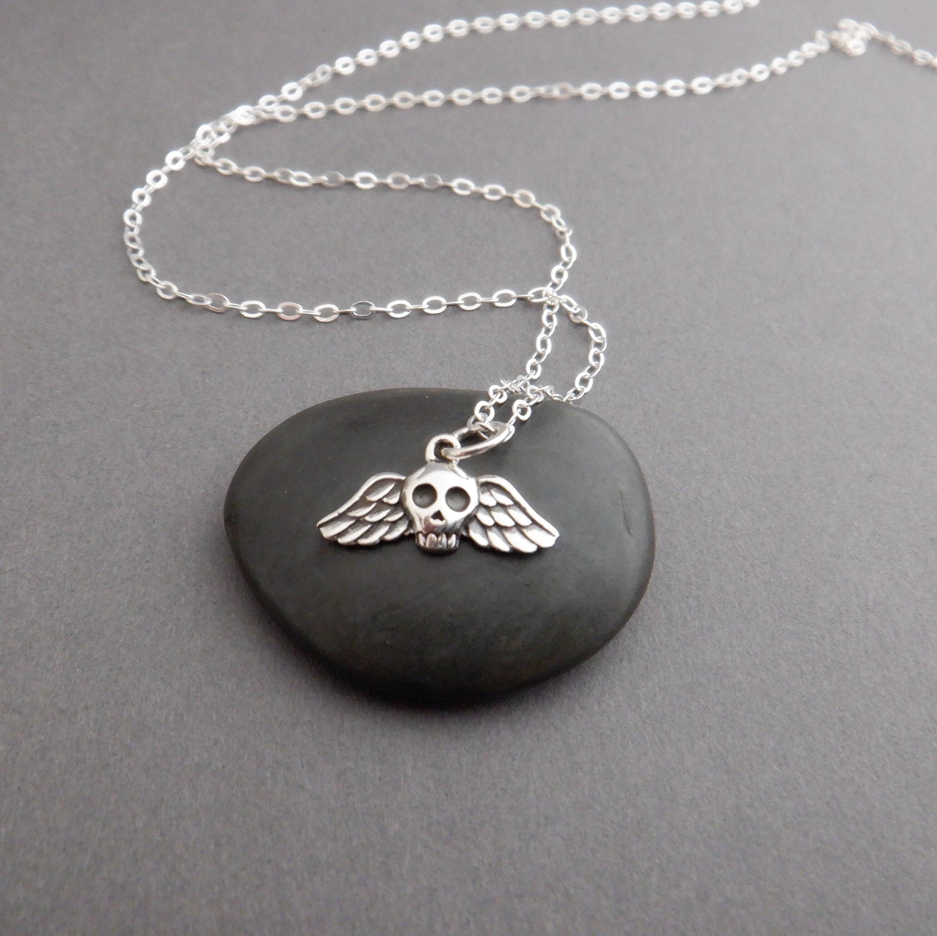 mini sterling silver winged skull necklace. tiny Halloween goth charm. gothic ghoul jewelry. petite spooky pendant. memorial mystical 5/8"