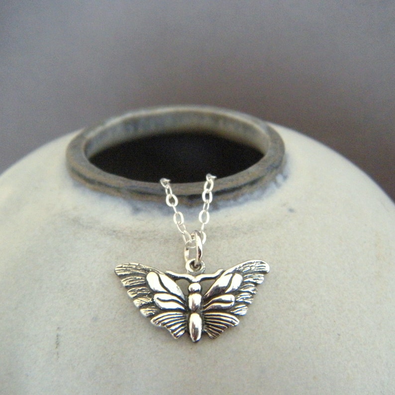 tiny sterling silver butterfly moth necklace petite insect charm dainty delicate decorative wings jewelry everyday nature enthusiast 3/4 image 2