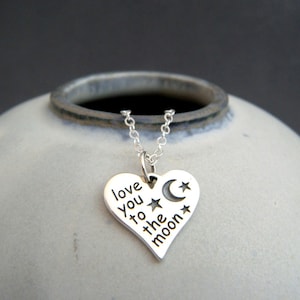 love you to the moon silver heart necklace. small sterling silver pendant. affirmation. simple charm word jewelry new mom baby gift
