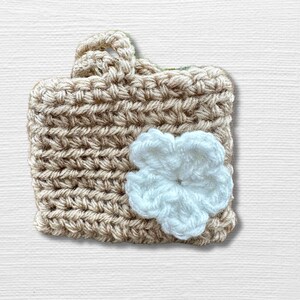 Beige Crocheted Earbud Case with White Flower Wireless Airpods Holder with Long Loop Closure
