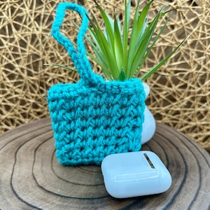 Blue Crocheted Wireless earbud case, compatible with AirPods, measures 3 T 3 H .25 D, Pretty Crochet Stitch Design