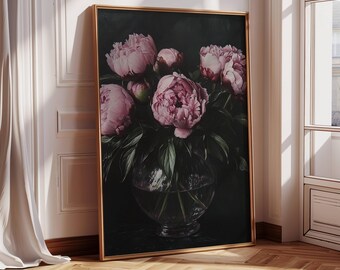 May include: A framed print of a bouquet of pink peonies in a clear glass vase against a dark background.