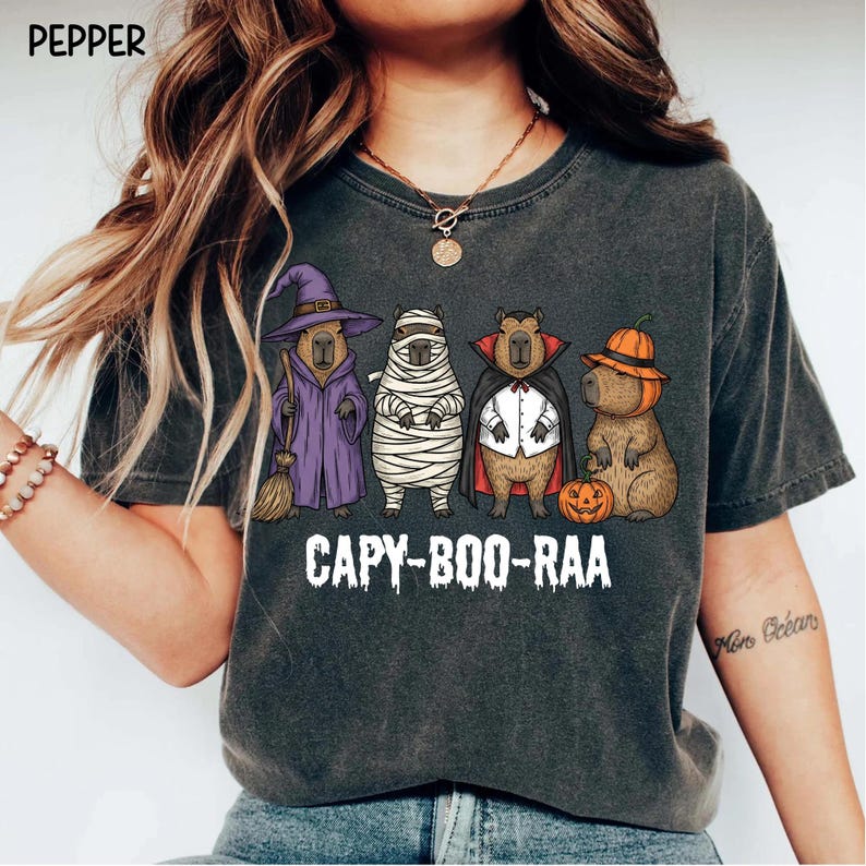 Celebrate spooky season in style with this Halloween Capybara Social Club shirt — perfect for anyone who loves retro vibes, chill capybara energy, and a touch of festive flair! Printed on ultra-soft Comfort Colors®, this Halloween t-shirt is a must-have for fall. Whether you’re rocking a spooky and cute look, a pumpkin capybara tee, or a playful ghost capybara vibe, this design blends cozy comfort with trendy social club style for the ultimate autumn statement.