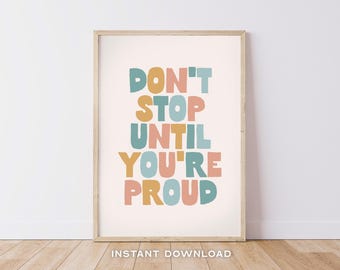 May include: A printable poster with the text "Don't Stop Until You're Proud" in colorful, stylized letters. The letters are in shades of blue, yellow, and pink.