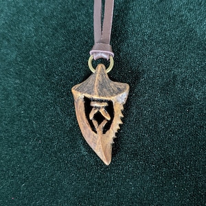 Iron Bull&#39;s Kadan Dragon Tooth - Dragon Age Inquisition