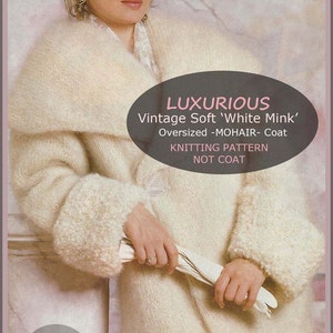 May include: A knitting pattern for a luxurious, oversized white mohair coat. The pattern is for a size 52 inch bust. The pattern is titled "Vintage Soft 'White Mink'" and is labeled "Knitting Pattern, Not Coat".