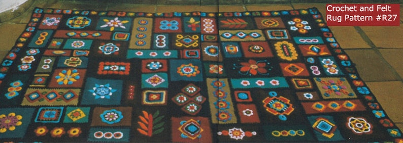 May include: A vibrant, handmade rug featuring a repeating pattern of geometric and floral motifs in teal, brown, orange, and yellow. The rug has a dark background and the text "Crochet and Felt Rug Pattern #R27".