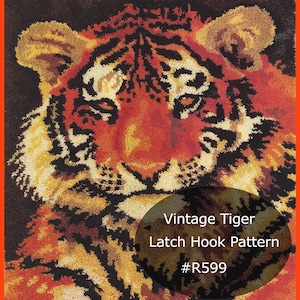 May include: Vintage latch hook pattern of a tiger's face. The tiger has orange, black, and white fur. The pattern is labeled "Vintage Tiger Latch Hook Pattern #R599".